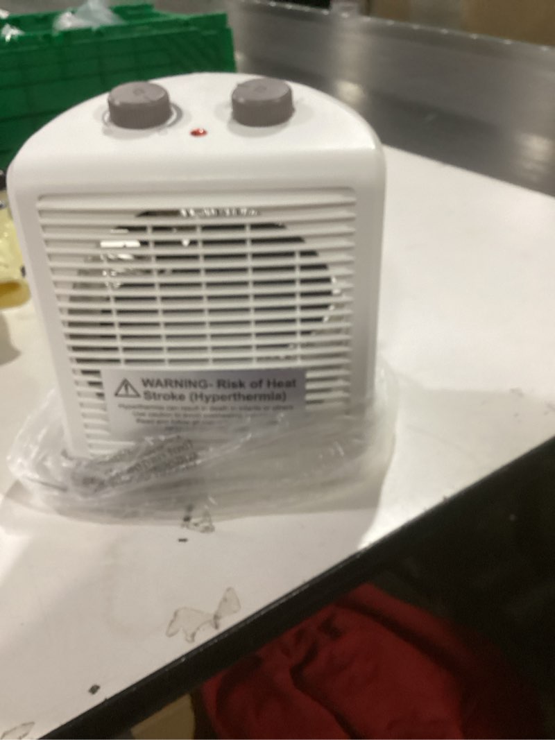 Condition photo showing As Is for  Utilitech 1500 -Watt Fan Compact personal Indoor Electric Space Heater with Thermostat