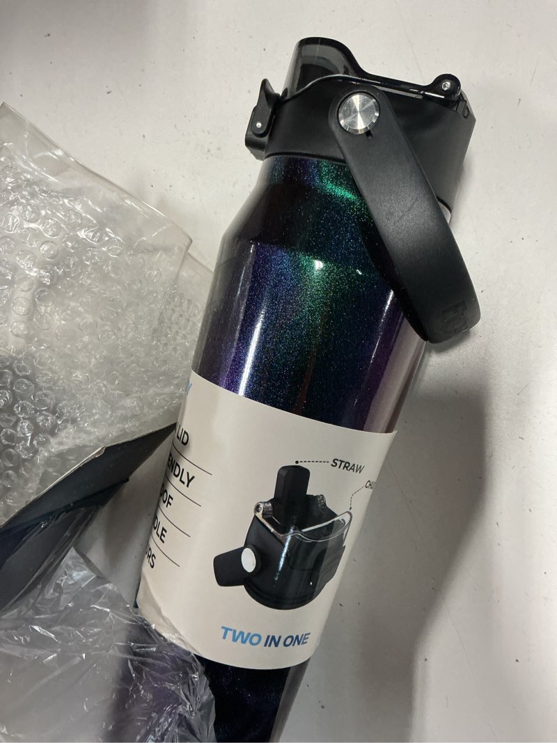 Condition photo showing Good Condition for frost buddy 32oz insulated water bottle - straw & chug lid - leak-proof | sip-or-chug dual lid | ice-cold for 24+ hours | cup-holder friendly | durable & easy to clean 32 ounces lights