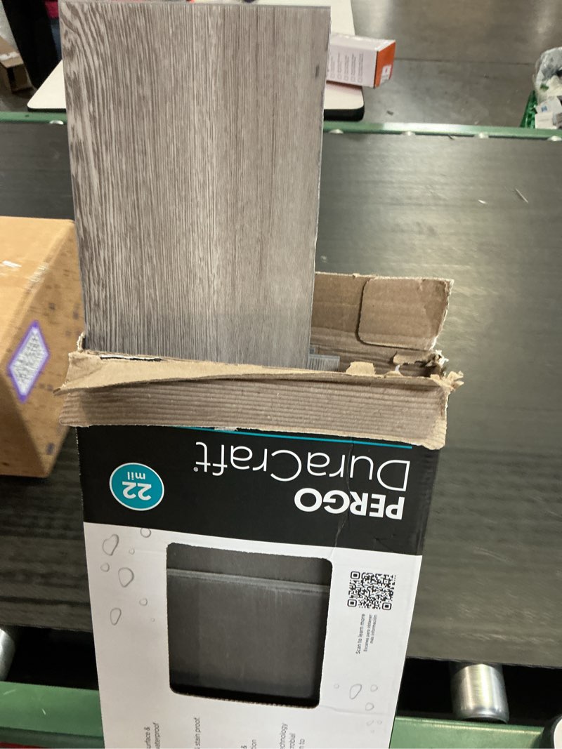 Condition photo showing As Is for interlocking vinyl flooring planks 36" x 6", 14 planks covers 21 sq.ft per box, brown or grey, 5mm thick diy easy snap lock together oak wood grain luxury vinyl flooring for home