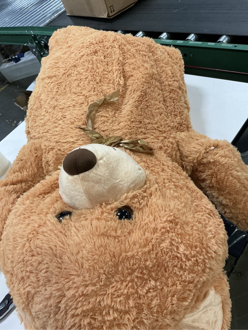 Condition photo showing As Is for MorisMos Giant Stuffed Animal, Life Size Teddy Bear, 51in Large Cuddly Plush for Baby Shower, Birthday, Valentine (Light Brown) 52" Beige