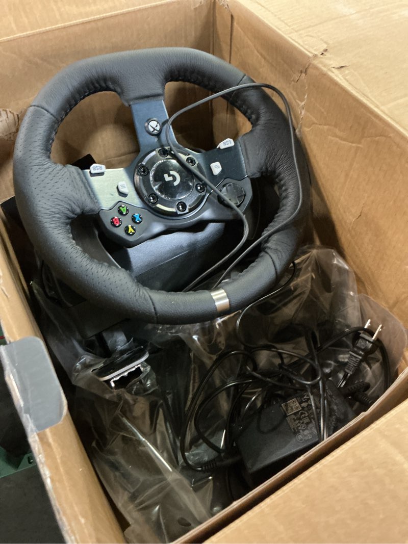Condition photo showing As Is for Logitech G920 Driving Force Racing Wheel and Floor Pedals, Real Force Feedback, Stainless Steel Paddle Shifters, Leather Steering Wheel Cover for Xbox Series X|S, Xbox One, PC, Mac - Black Wheel Kit - Black