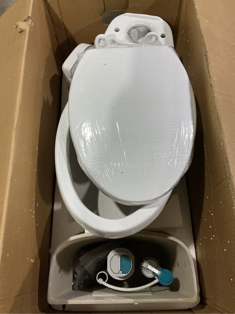 Condition photo showing Good Condition for (chipped)gerber maxwell select elongated dual-flush 1.0/1.28 gpf two-piece toilet, ada chair height, 12-in rough-in, high efficiency, soft-close seat & install kit with wax ring, white, grd49210e