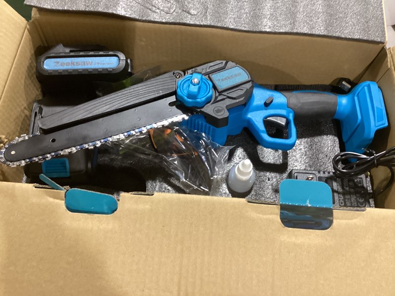 Condition photo showing Good Condition for 8 Inch Electric Chainsaw Cordless With Auto Oiler, Seniors Friendly Batteries Powered Hand held Chain saw Kit, Automatic Chain Tensioning & Auto Oiler For Tree Branches, Courtyard, And Garden 8 Inch MAX Kit - TOOL FREE