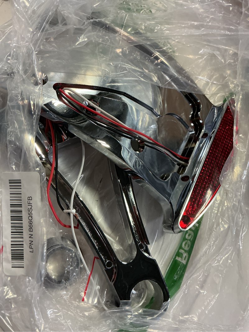 Condition photo showing As Is for artudatech motorcycle chrome curve license plate side mount license w/led tail light brake light 1" axles for harley, for honda, for yamaha, for suzuki, for kawasaki (for off road use only)