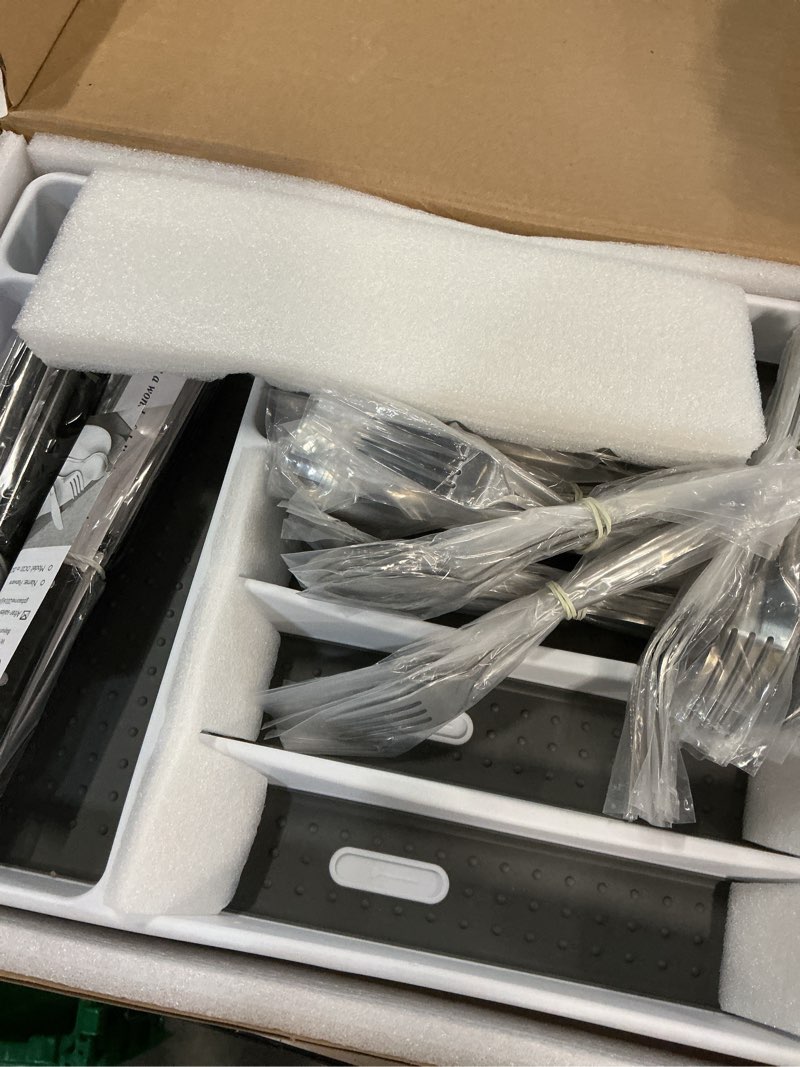 Condition photo showing New/Like New for 49-piece silverware set with organizer, heavy duty stainless steel flatware set for 8, cutlery utensil sets with steak knives, rust-proof, mirror polished, dishwasher safe, heavy duty
