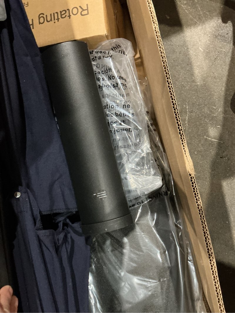 Condition photo showing As Is for unknown brand. 10-foot cantilever patio umbrella in navy blue