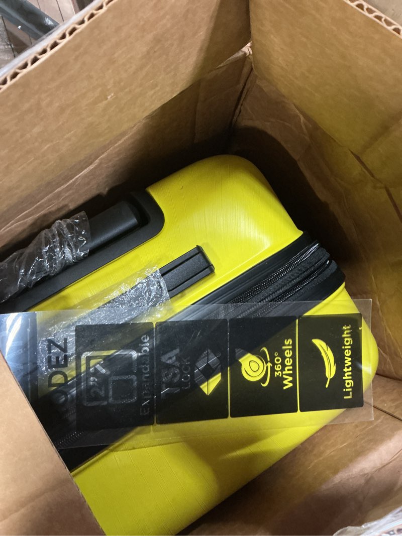 Condition photo showing Good Condition for DUKAP RODEZ Hardside Luggage with Ergonomic Handles and TSA Lock | Spacious Traveling Suitcase, Travel Suitcase with Four Spinner Wheels and Studs | 24" Medium Luggage | Yellow 24 Inch Yellow