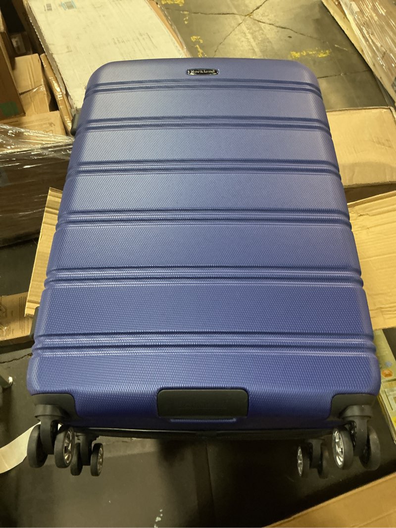 Condition photo showing Good Condition for Rockland Melbourne Hardside Expandable Spinner Wheel Luggage, Blue, Checked-Large 28-Inch