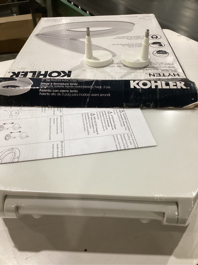 Condition photo showing New/Like New for KOHLER 25876-0 Hyten 3" Height, Elevated Soft Close Round Toilet Seat, Contoured Seat with Grip-Tight Bumpers, Quick-Attach Hardware, White White Round