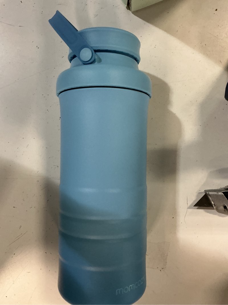 Condition photo showing New/Like New for momcozy 22oz portable breast milk cooler for outdoor, life saver with 360° total cooling for 24 hours, larger capacity travel breastmilk chiller with 2pcs baby bottles for breastmilk storage green