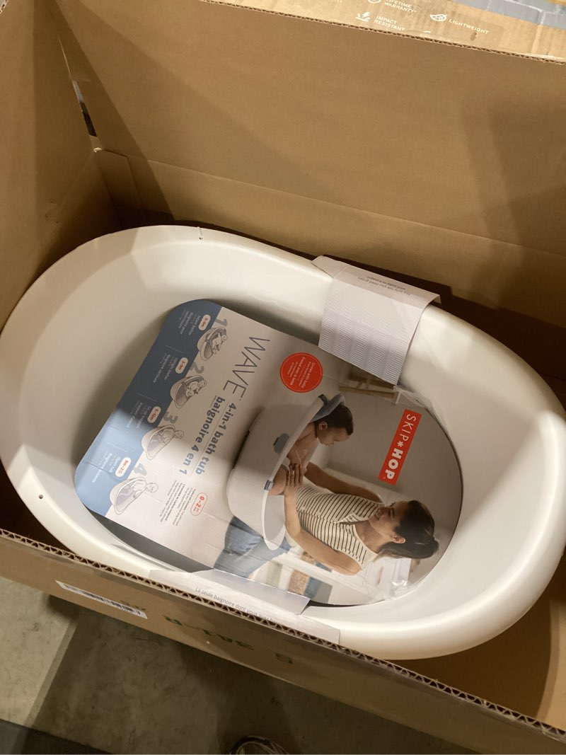 Condition photo showing Good Condition for skip hop baby bath tub 4-in-1 grow with baby infant to toddler bathtub with supportive sling and sit-up support wave age 0m+ wave tub