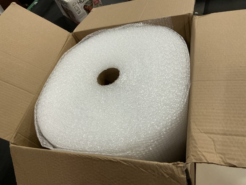 Condition photo showing New/Like New for Amazon Basics Bubble Wrap for Moving, Packing, Shipping and Storage, Perforated Protective Cushioning for Fragile Items, 12-inch x 175-ft Long Roll, Small 3/16", Clear Clear 12 inch x 175 ft
