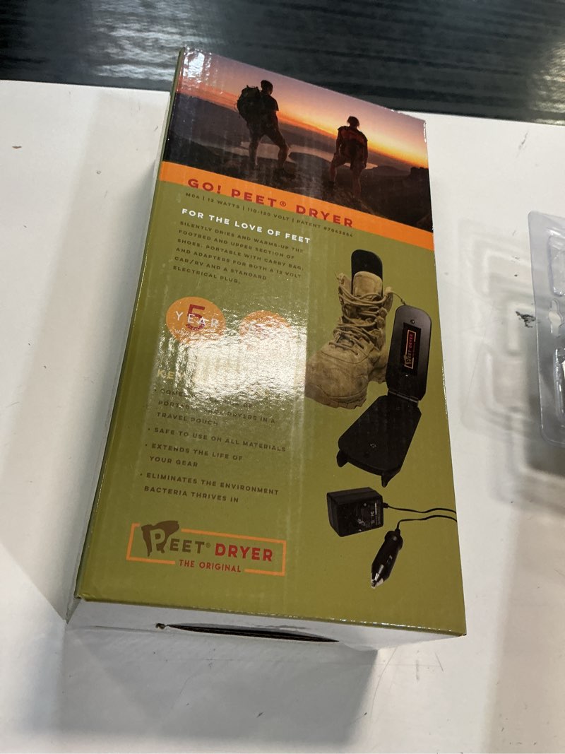 Condition photo showing New/Like New for peet - go! portable 2-shoe electric dryer with vehicle power adapter