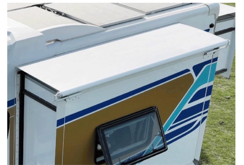 White awning pull out, size unknown 