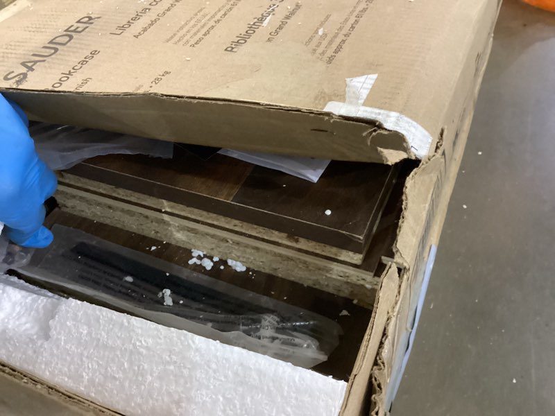 Condition photo showing As Is for Sauder 3 Tier Book Shelf Wooden Bookcase Multipurpose Bookshelf for Home Office, Living Room, in Grand Walnut Grand Walnut Finish