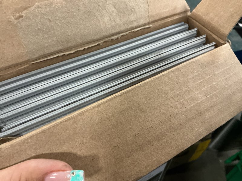 Condition photo showing As Is for stainmaster ainsley brown 12-mil x 7-in w x 48-in l waterproof interlocking luxury vinyl plank flooring (18.78-sq ft/ carton)