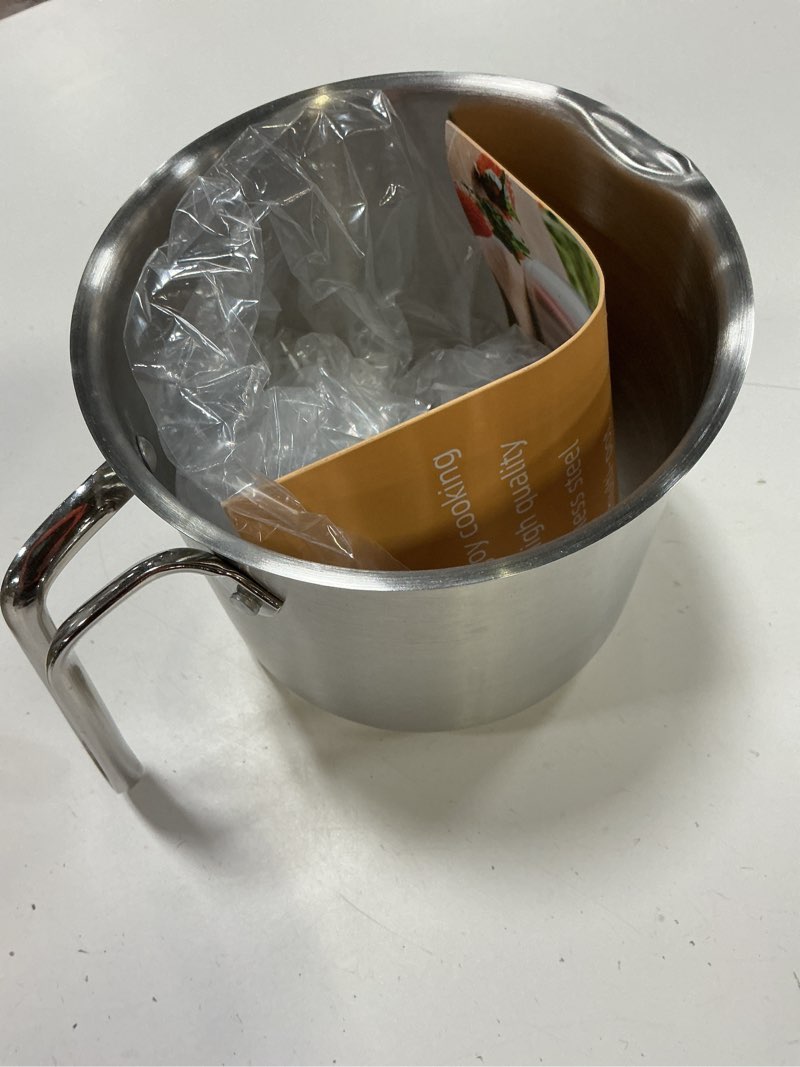 Condition photo showing As Is for 1.5 quart stainless steel saucepan with pour spout, saucepan with lid, mini milk pan with spout - perfect for boiling milk, sauce, gravies, pasta, noodles 1.5 quarts