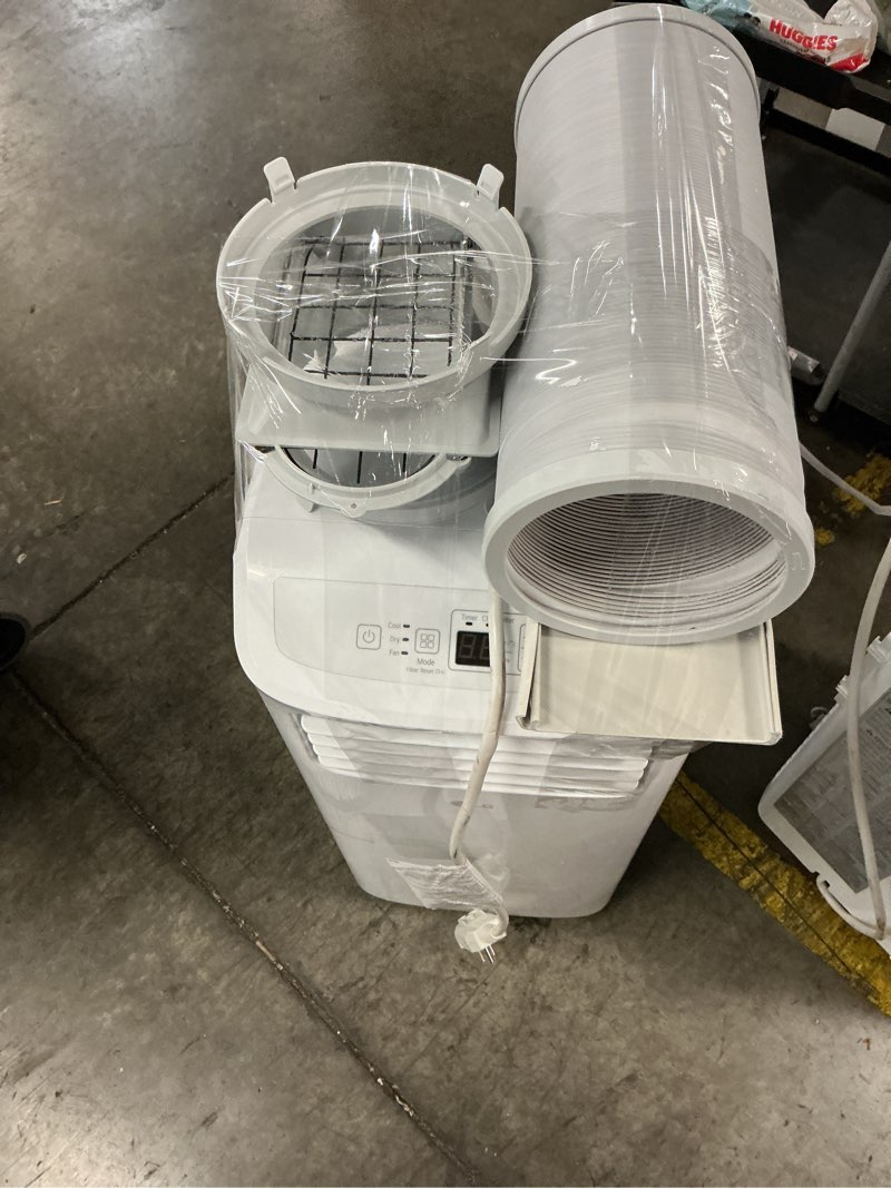Condition photo showing As Is for 6,000 btu (sacc) / 8,765 btu (ashrae) portable air conditioner | cools up to 250 sq. ft