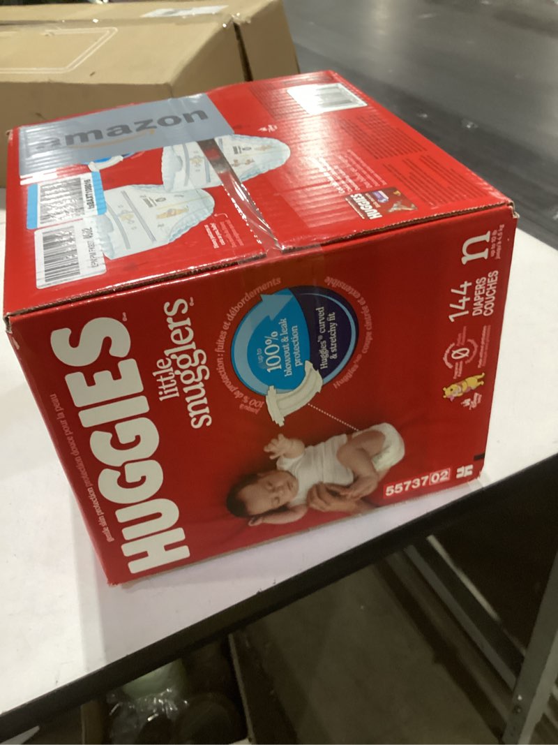 Condition photo showing New/Like New for Huggies Size Newborn Diapers, Little Snugglers Baby Diapers, Size Newborn (up to 10 lbs), 144 Count, Packaging May Vary