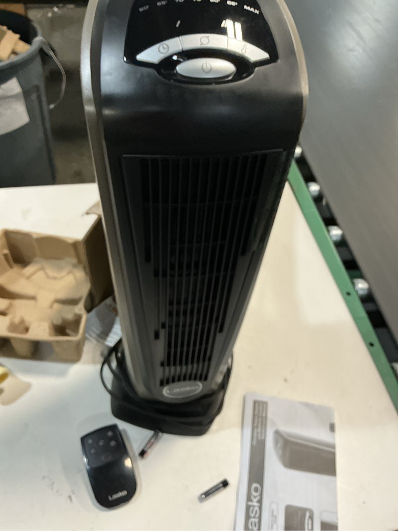 Condition photo showing As Is for Lasko 1500W Ceramic Tower Space Heater with Remote, Thermostat, Timer & Widespread Oscillation, Portable Electric Heater for Indoor Use, Bedroom & Living Room, 751320