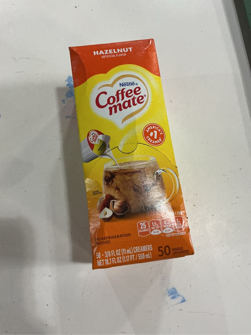 Condition photo showing New/Like New for (best if used by 02/2026) coffee-mate hazelnut creamer, 375 oz., 50 creamers/box - 1 pack