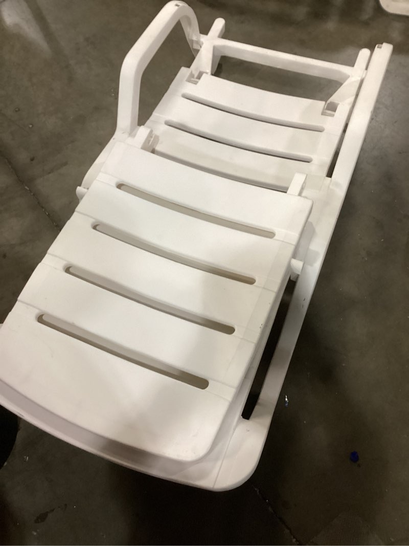 Condition photo showing As Is for adams manufacturing stackable white resin frame stationary chaise lounge chair with slat