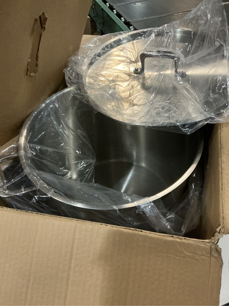 Condition photo showing Good Condition for stainless steel stockpot with lid 24 quart, durable 18/8 stainless steel, impact-bonded base for even heating, riveted handles, oven & all stove compatible, safe up to 500°f (260°c) 24 quarts