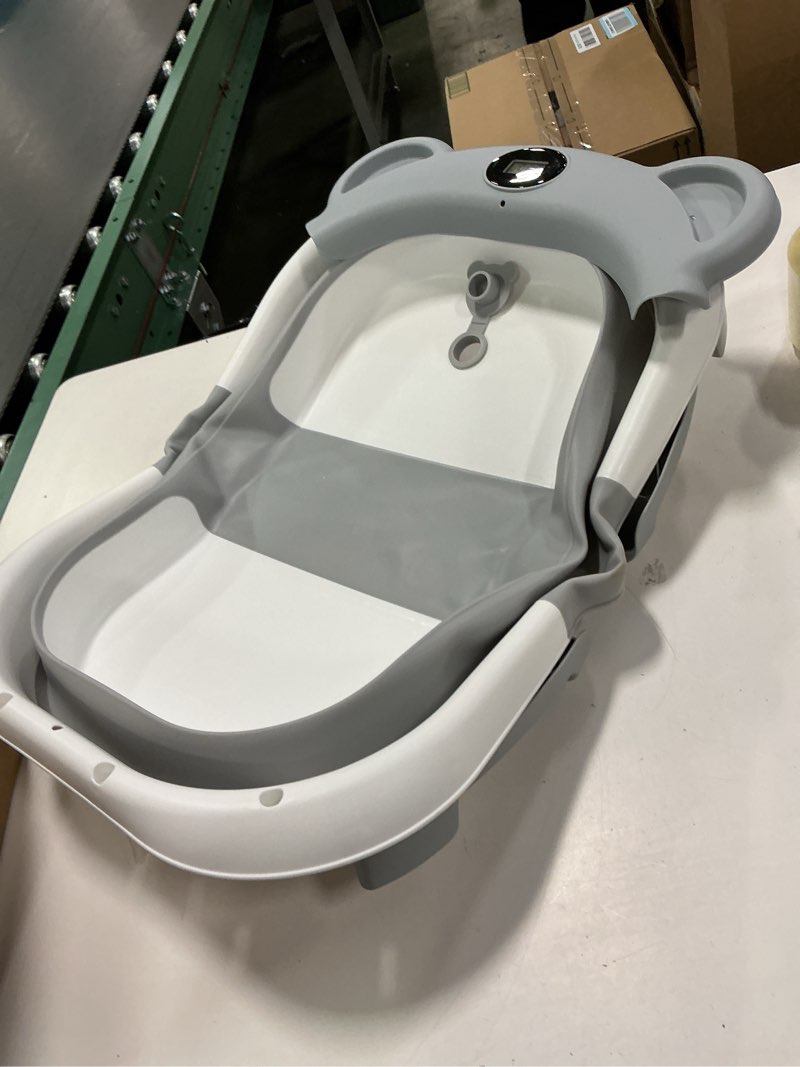 Condition photo showing As Is for Collapsible Baby Bathtub for Newborn to Toddler (0-18 Month) - Portable Baby Bath Tub for Travel, Newborn Bathtub with Soft Towel and Floating Cushion (Gray)