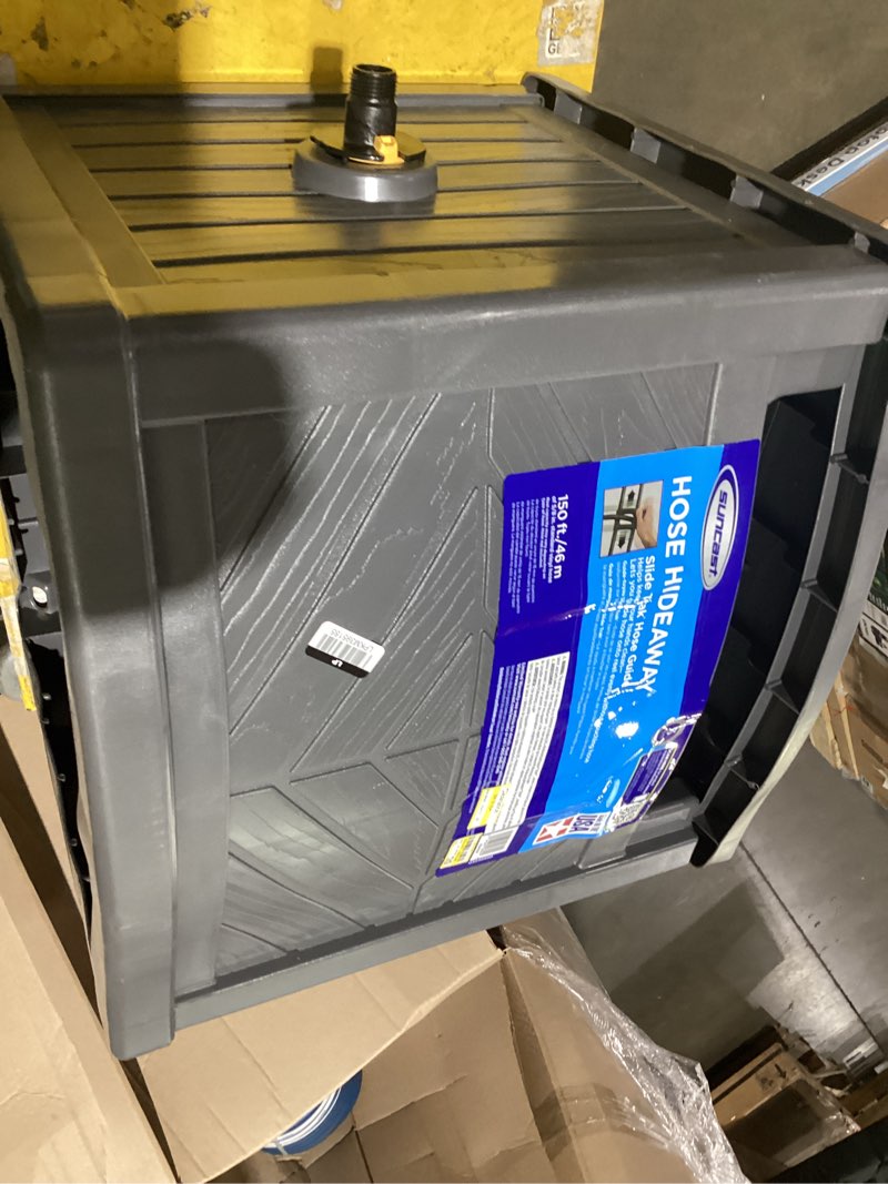 Condition photo showing As Is for suncast 150 ft. gray free standing hideaway hose reel