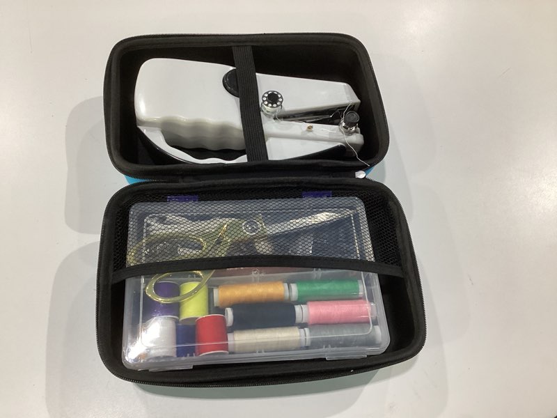 Condition photo showing As Is for Handheld Sewing Machine,Two dear,Mini sewing machine,Easy to Use and Fast Stitch Suitable for Clothes,Fabrics, DIY Home Travel Electric Handheld Sewing Machine.Black, SIMILAR TO STOCK PHOTO