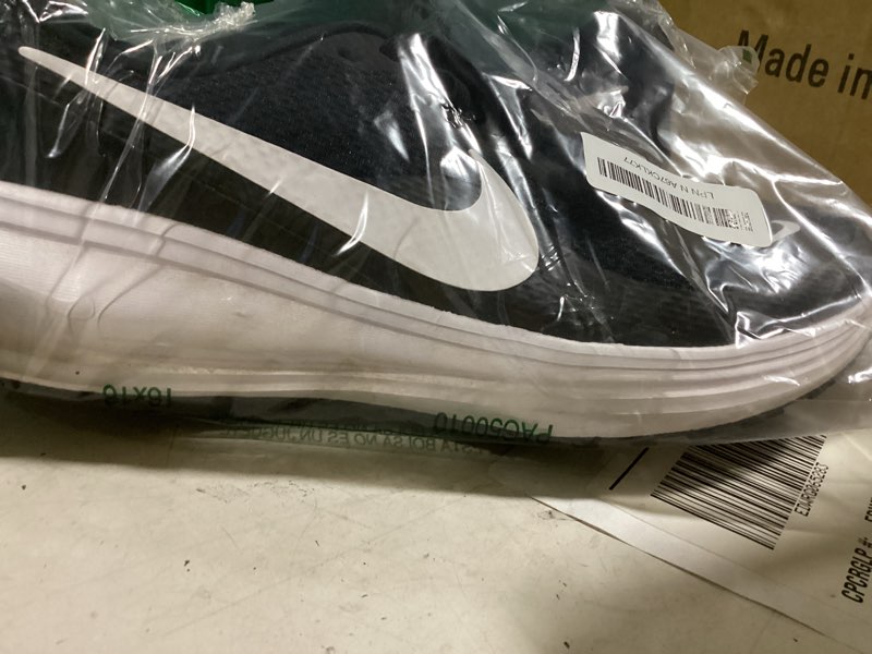 Condition photo showing As Is for nike men's revolution 8 road running shoes 11.5 black/white/black