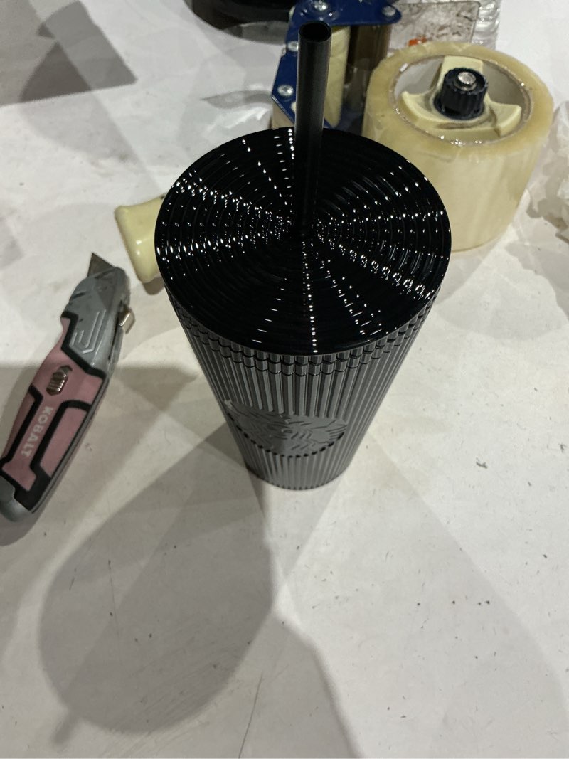 Condition photo showing Good Condition for starbucks black pleated metallic tumbler 2024 16 oz never used, no straw