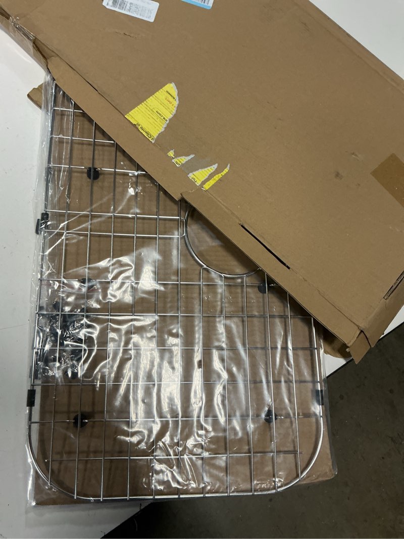 Condition photo showing New/Like New for serene valley sink protector grid 26-1/16" x 14-1/16", rear drain with corner radius 3-1/2", 304 stainless steel material nlw2614r