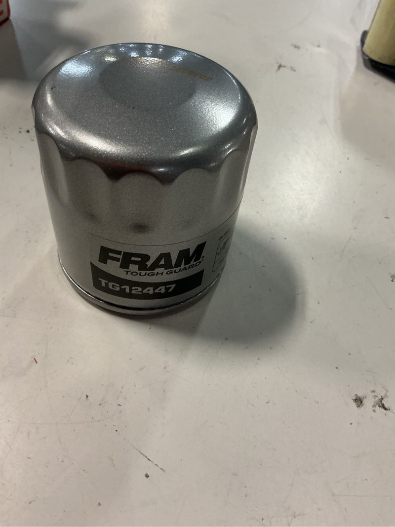Condition photo showing New/Like New for fram tough guard replacement oil filter tg12447, designed for interval full-flow changes lasting up to 15k miles for select gmc, chevrolet, cadillac and buick model years