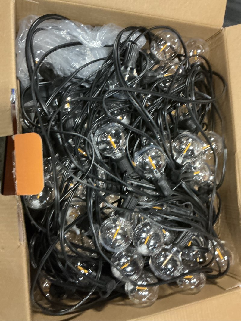 Condition photo showing Good Condition for ollny 110ft solar string lights for outside, waterproof remote control dimmable timers 3modes outdoor light with 50 led + 2 spare shatterproof bulb, g40 hanging lights for patio pool house garage 110 feet