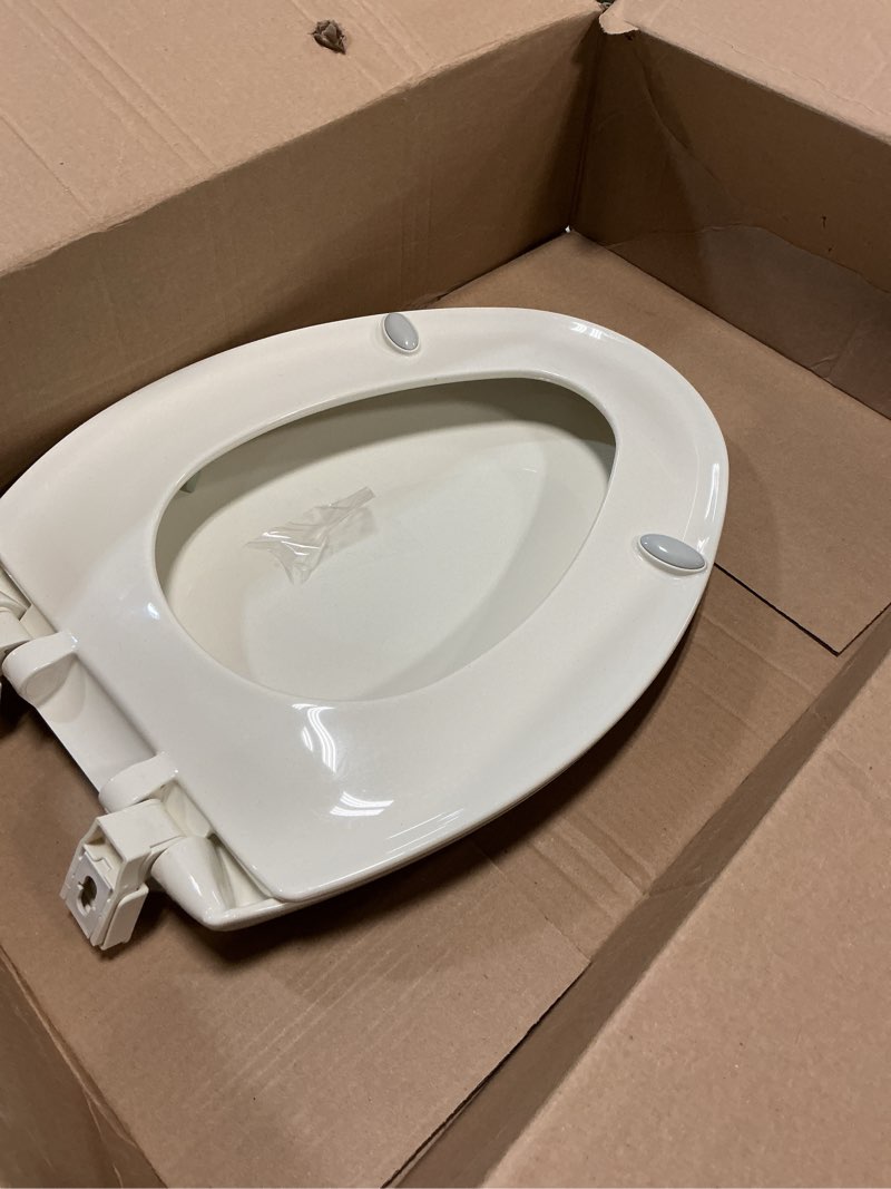 Condition photo showing As Is for Mayfair Cassel Slow Close Toilet Seat, Easy Clean, Non Slip Premium Wood Seat, Easy Install, Made in USA, Round, White Round 1 - Toilet Seat