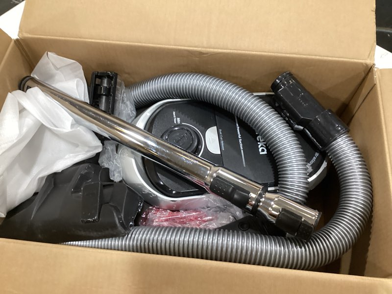 Condition photo showing As Is for eureka bagless canister vacuum cleaner, lightweight vac for carpets and hard floors, silver with black, nen180