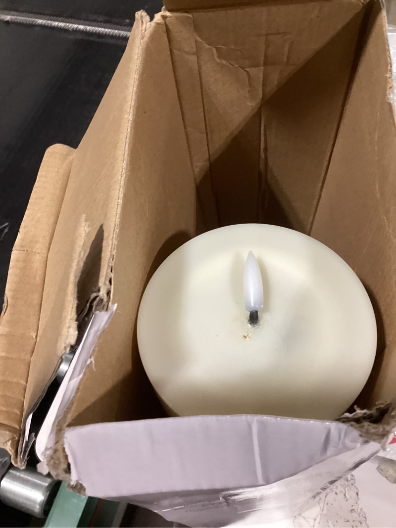 Condition photo showing As Is for 14" x 4" large flameless candles with remote & timer, waterproof outdoor battery operated candles led electric flickering flameless pillar candle for patio porch lanterns home decor easter, 2 pack 14" x 4" 2 pack