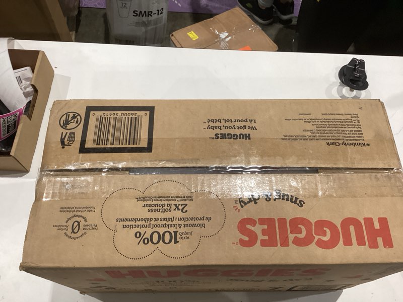 Condition photo showing New/Like New for huggies snug & dry baby diapers, size 7 (41+ lbs) 108 count 
