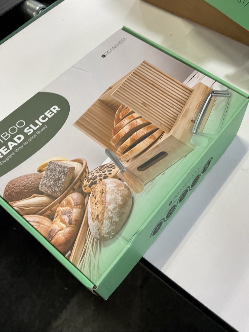 Condition photo showing New/Like New for Adjustable bread loaf slicer + bread slicer guide for sourdough; sandwich bread slicer, butter cutter and spreader knife + foldable design, crumb tray, non-slip base, compact storage