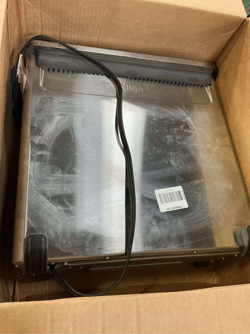 Condition photo showing As Is for Ninja Air Fryer Toaster Oven Combo | 8-in-1 Functionality | Flip Up & Away for Storage Space | Air Fry Basket, Sheet Pan, Wire Rack & Removable Crumb Tray |1800 Watt | Stainless Steel | SP151 Stainless Premium 8-in-1 Flip Oven