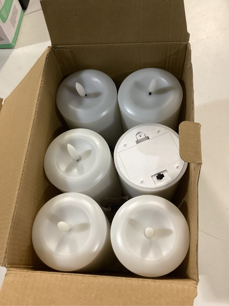 Condition photo showing Good Condition for Hinabichan Flameless Candles Battery Operated with Remote and 2/4/6/8 H Timer, 6pcs Flickering Fake Electric Candles for Festival Wedding Home Party Decor (D3 x H 6\") (White) -1 is broken-