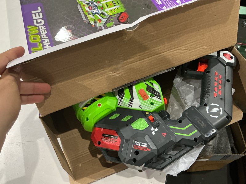 Condition photo showing Good Condition for xshot hyper gel glow motorized gatling blaster (10,000 pellets) outdoor blaster by zuru for ages 14+