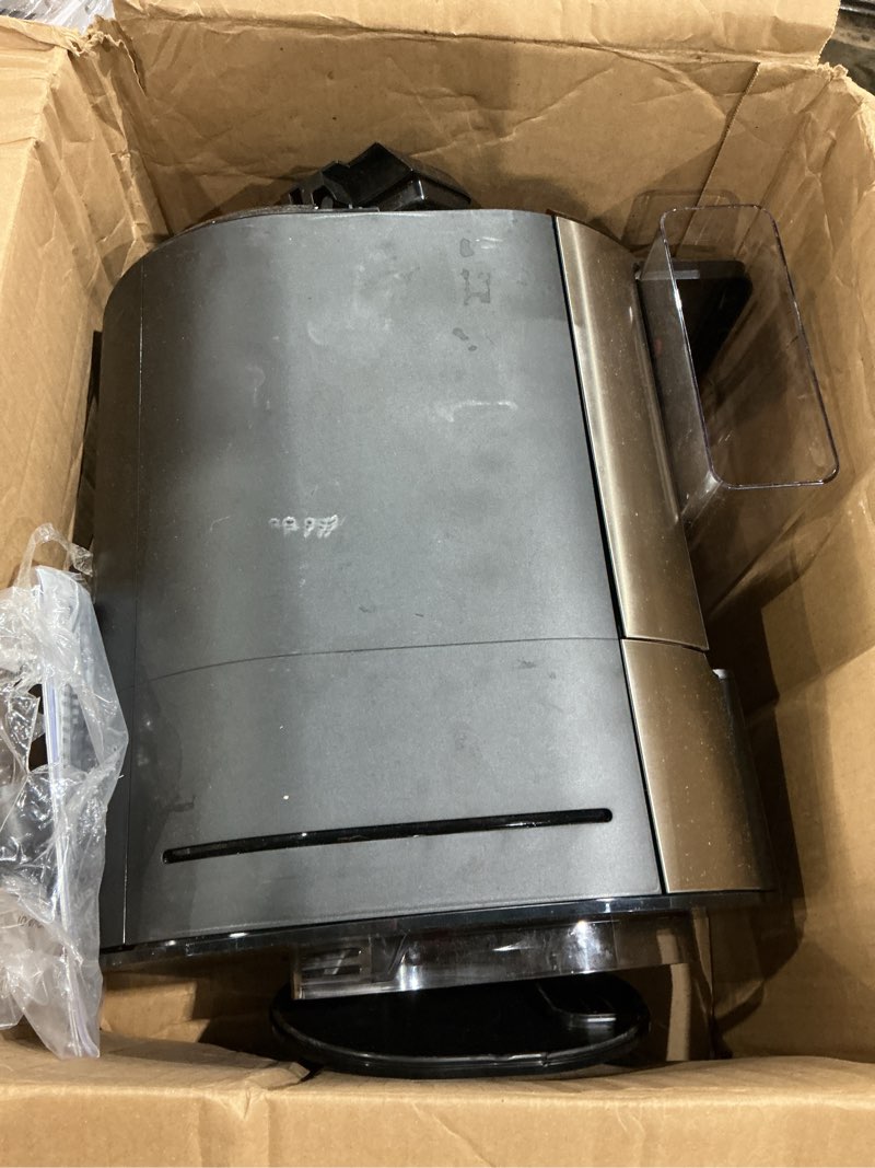 Condition photo showing As Is for de'longhi true brew drip coffee maker, built in grinder, single serve, 8 oz to 24 oz, hot or iced coffee, stainless, cam51025mb