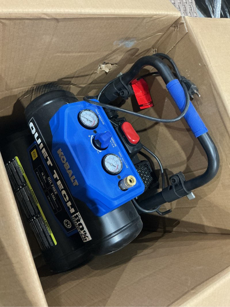 Condition photo showing As Is for kobalt quiet tech 4.3-gallon portable electric 150 psi twin stack air compressor