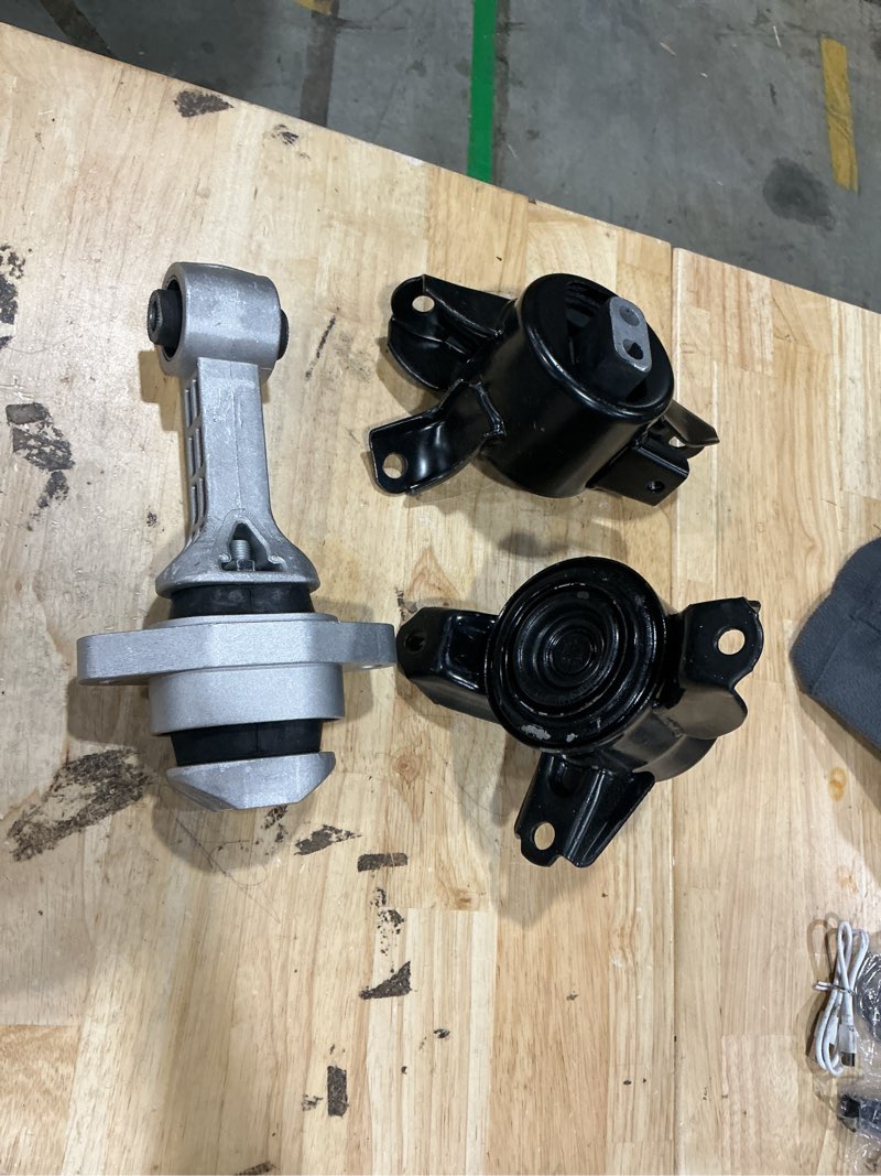 Condition photo showing As Is for engine motor & transmission mount