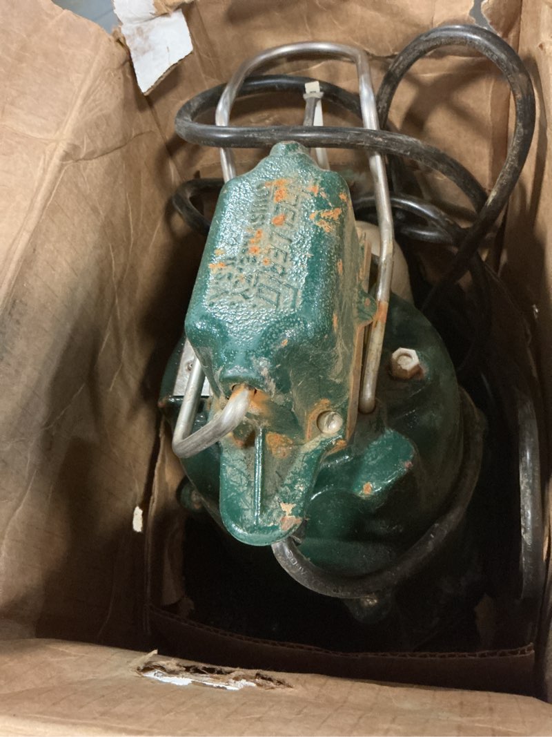 Condition photo showing As Is for zoeller m98 flow-mate sump pump - 1/2 hp - cast iron - led power plug - high flow - vortex impeller - stainless steel hardware - factory tested and float operated - submersible sump pump - 115v green submersible,sump pump