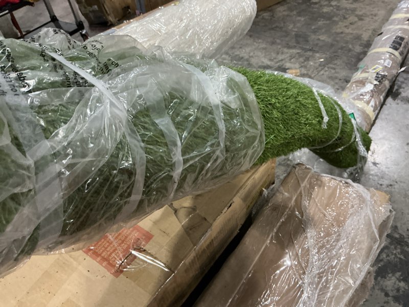 Condition photo showing Good Condition for Ottomanson 6' x 6'6" Artificial Faux Grass Rug - Realistic Turf with UV Protection - Perforated for Easy Drainage - Durable, Hose-Off Synthetic Lawn Carpet for Indoor & Outdoor Use, Green High Pile - 6 ft 6 in Wide 6-ft
