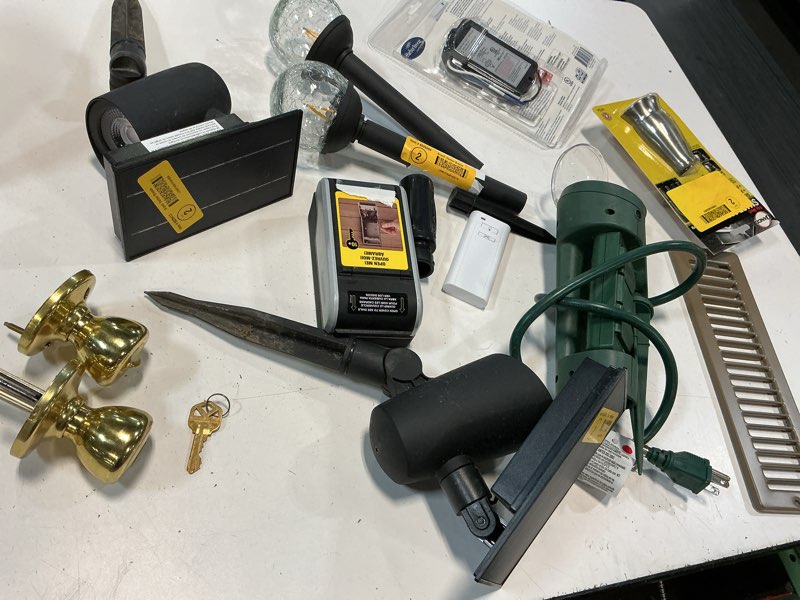 Condition photo showing As Is for assorted home improvement lot (small tools, screw, home accessories, brands etc.)