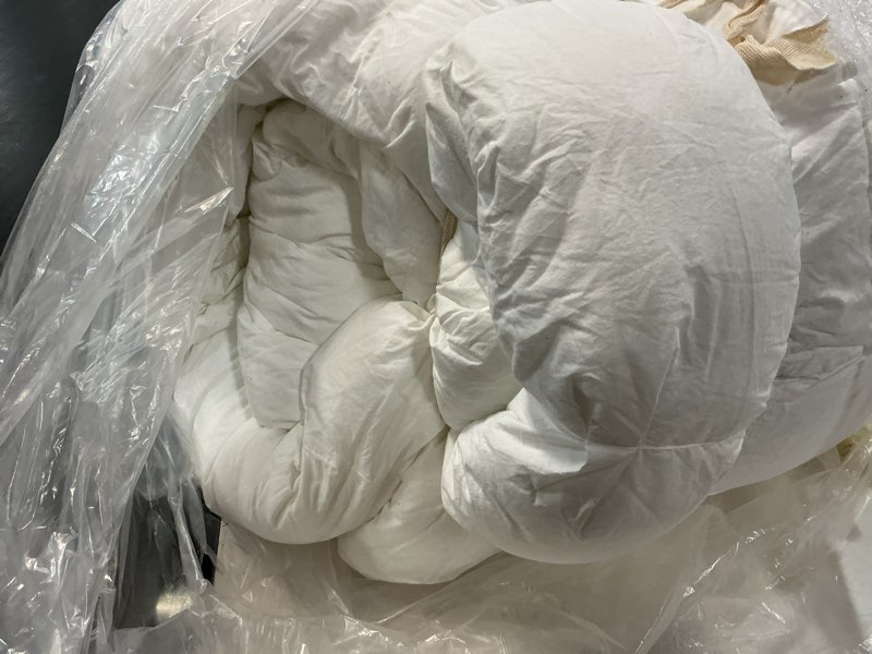 Condition photo showing As Is for cotton pintuck comforter, twin, white